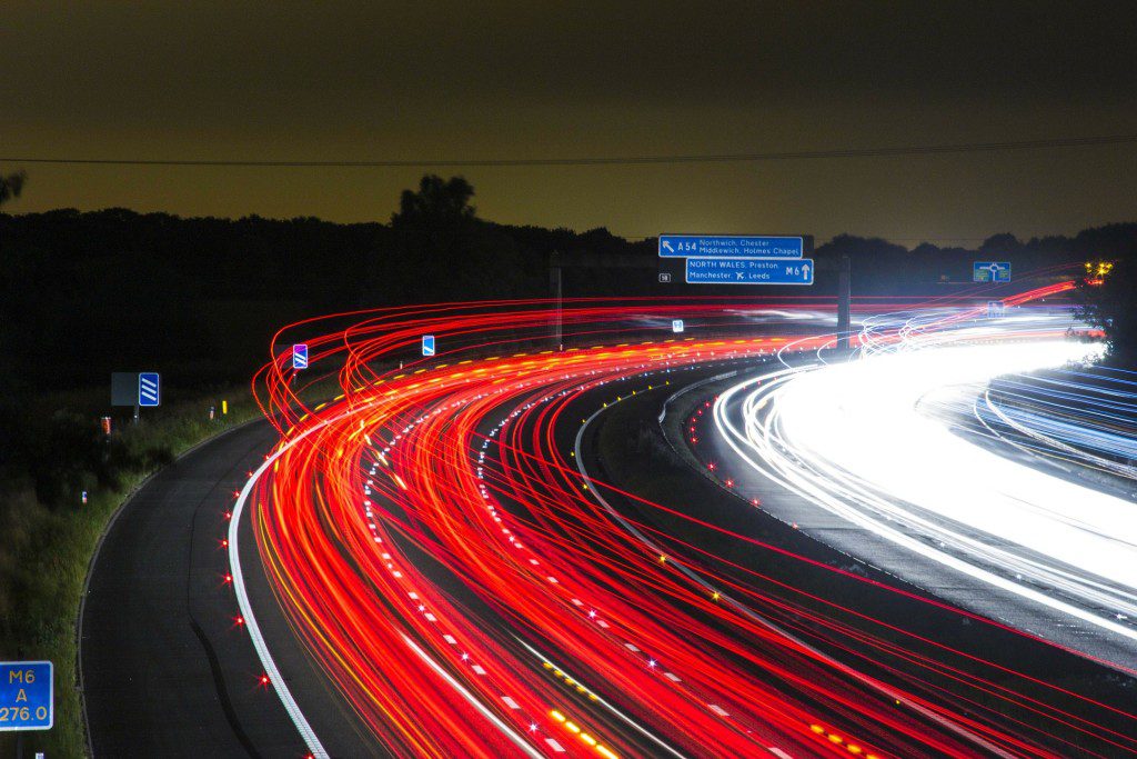 A long exposure photo of traffic at night.