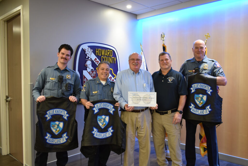 A group of men standing next to each other.