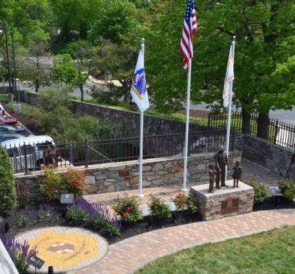 A stone walkway and brick wall combine to create a peaceful ambiance in the HCPD Memorial Garden.